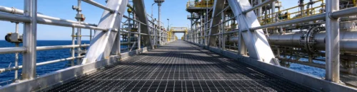 Galvanized steel grating industrial scene for technical catalog, load‑table and specification document download by Sino‑Grating